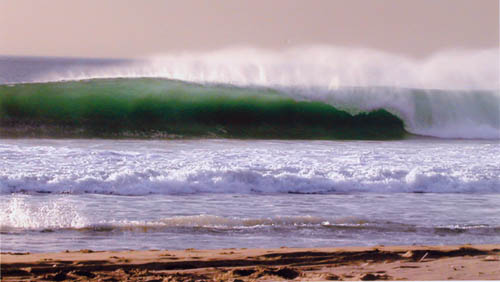 "The Green Room" (waves coming into shore; large wave appears deep green), Hermosa Beach