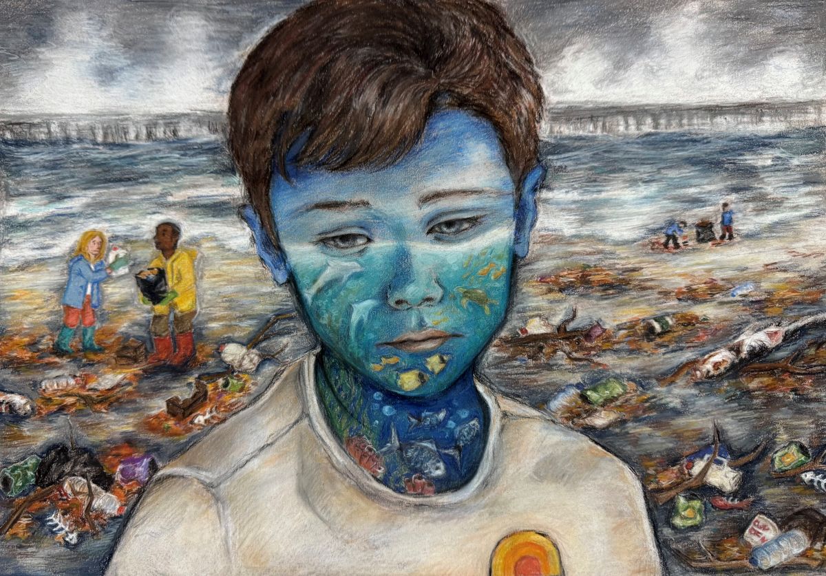 A young child stands in the middle of a beach littered with trash. A few people in the background can be seen picking up the trash. An image of a clean ocean with dolphins, sea turtles, and fish is projected on the child's face.