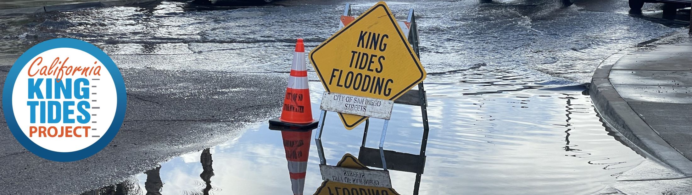 California King Tides Project. Snap the Shore, See the Future. Waves splash over beach access stairs