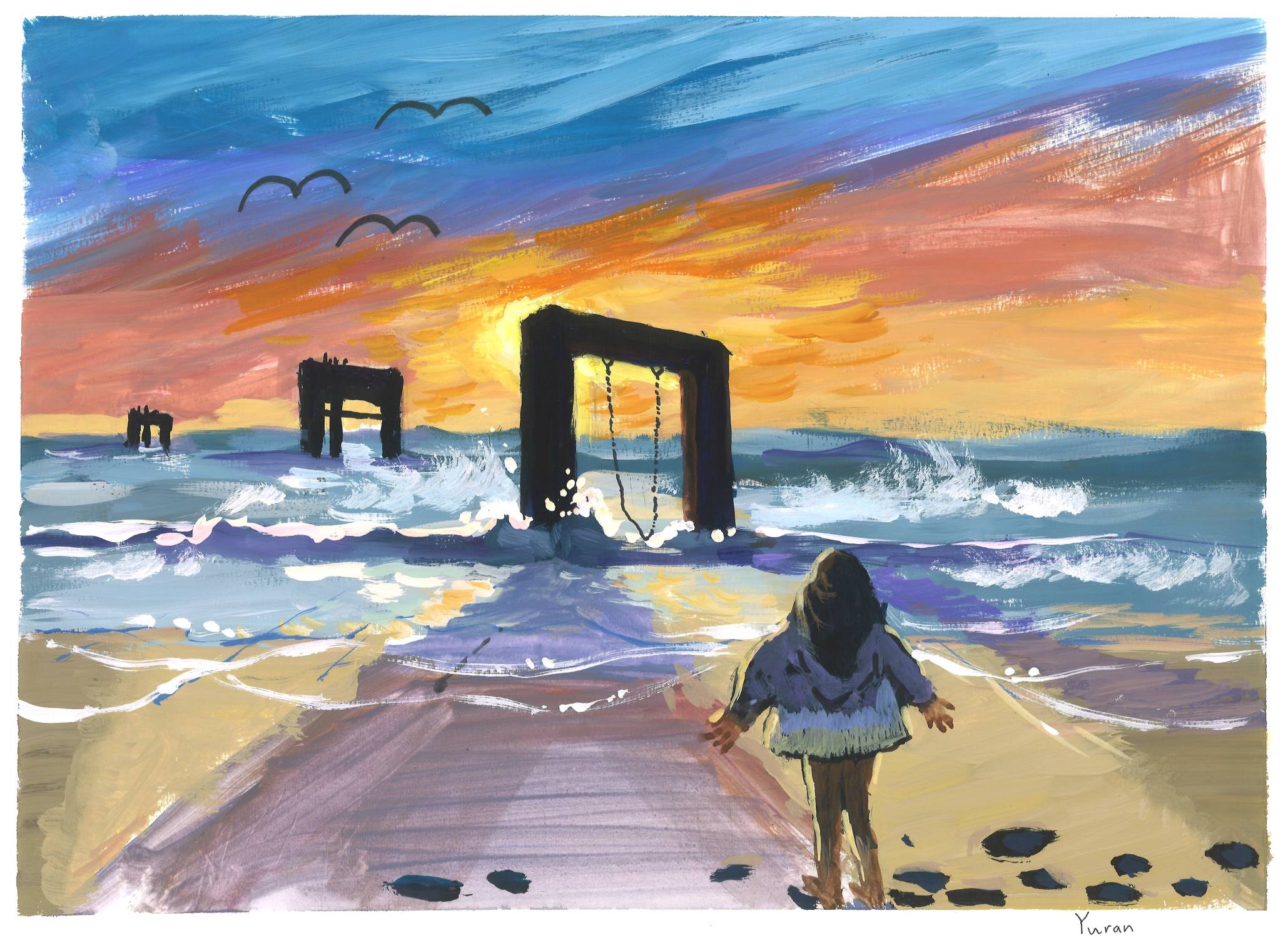 A child stands on the beach facing the ocean and the sunset. Remnents of a pier are in the distance.