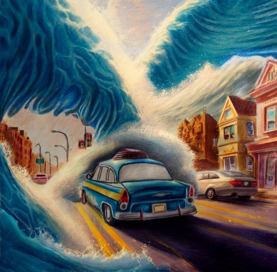 A taxi cab drives down a road lines with homes as huge waves arc over it and splash onto the road.
