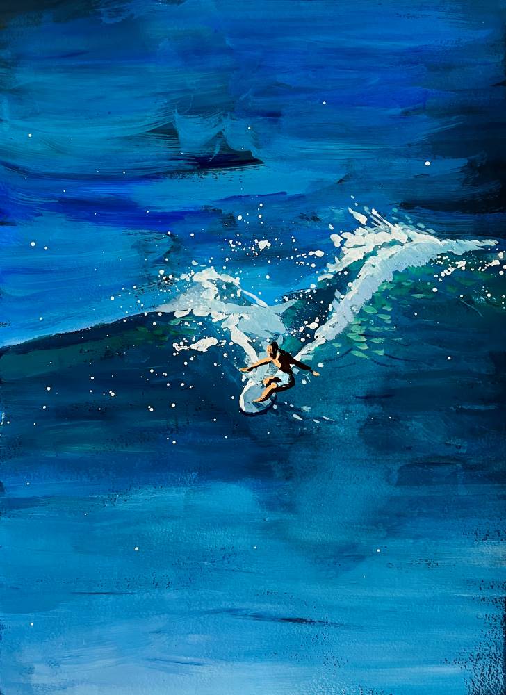 A surfer surfs a wave in an ocean of blue.