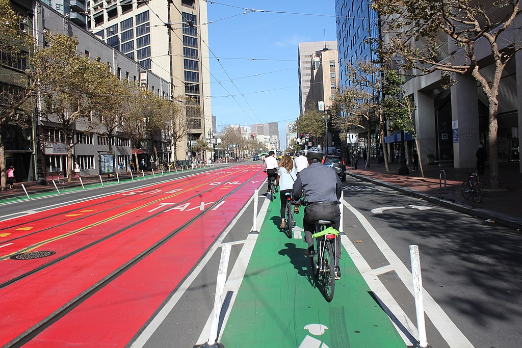A bike lane on Market Street in San 
								Francisco. There is a red transit lane next to the bike lane.
