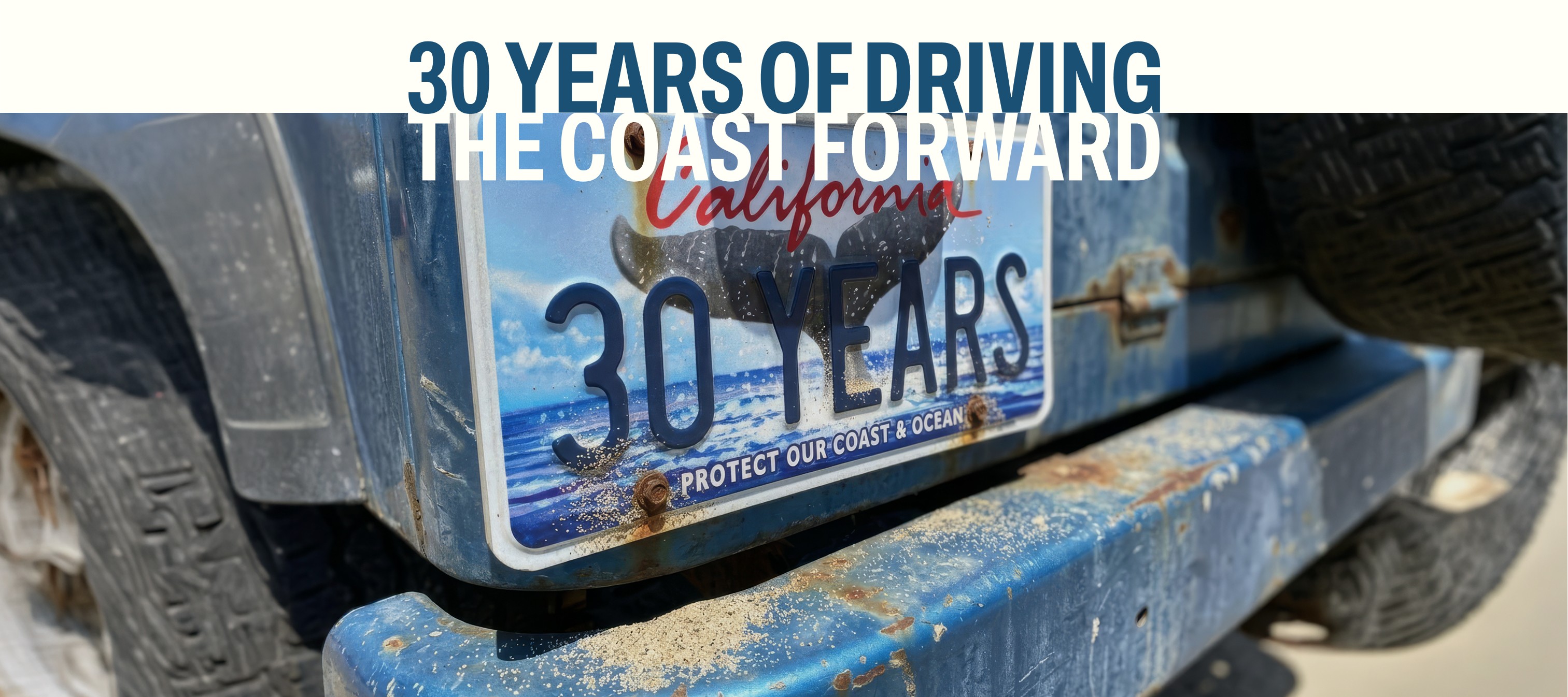 A photo of a Whale Tail License plate personalized with '30 YEARS' on a rusty old car. Text: 30 years of driving the coast forward.